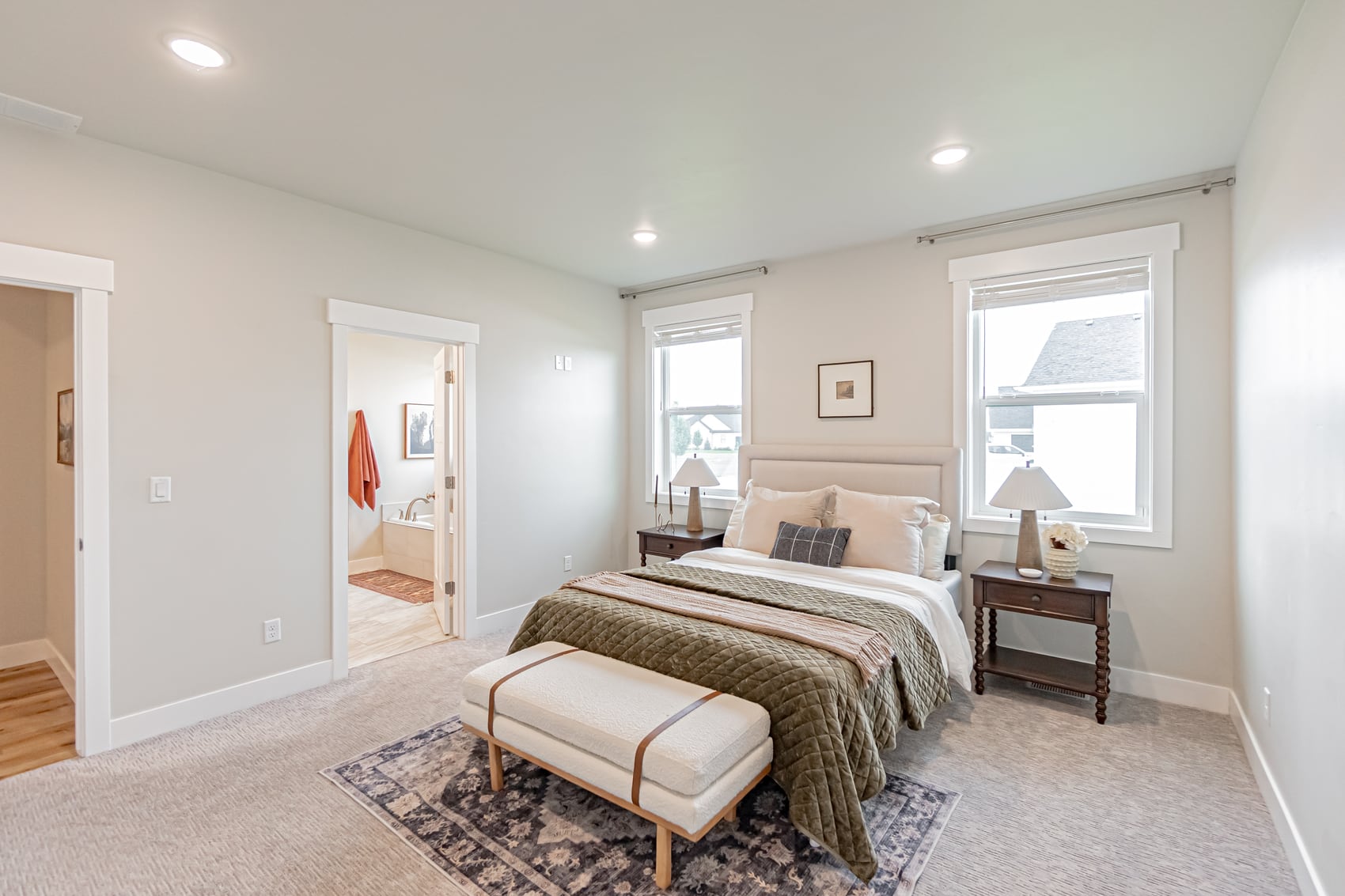 A vaulted bedroom with morning light
